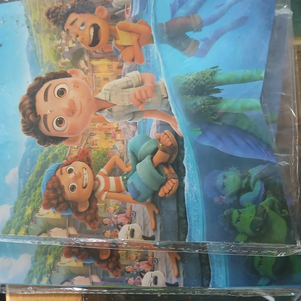 Colorful Birthday Cake Topper And Other Items For A Themed Party